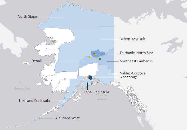Map presenting top defense contract spending locations within the state of Alaska with an overlay showing the positions of key military installations differentiated by service and active/reserve affiliation.
