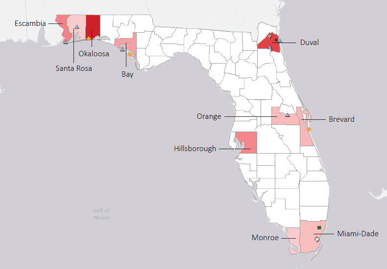 Map presenting top defense personnel spending locations within the state of Florida with an overlay showing the positions of key military installations differentiated by service and active/reserve affiliation.