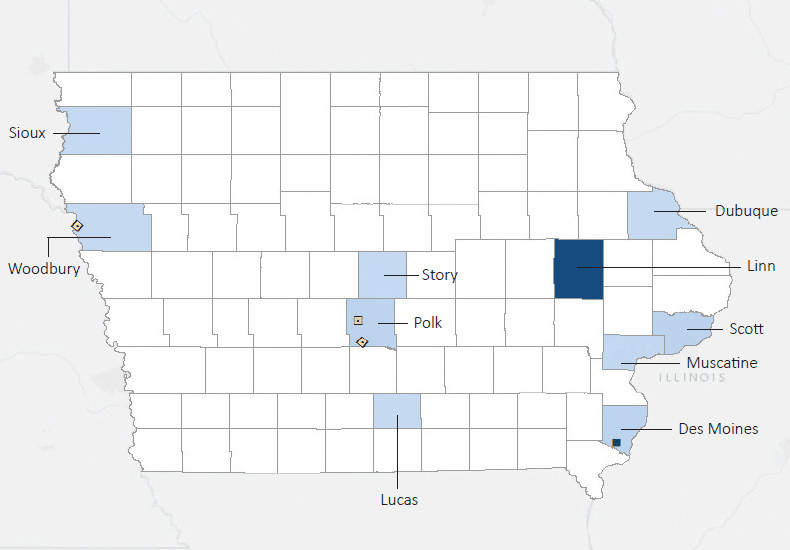 Map presenting top defense contract spending locations within the state of Iowa with an overlay showing the positions of key military installations differentiated by service and active/reserve affiliation.