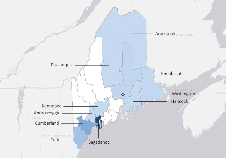 Map presenting top defense contract spending locations within the state of Maine with an overlay showing the positions of key military installations differentiated by service and active/reserve affiliation.