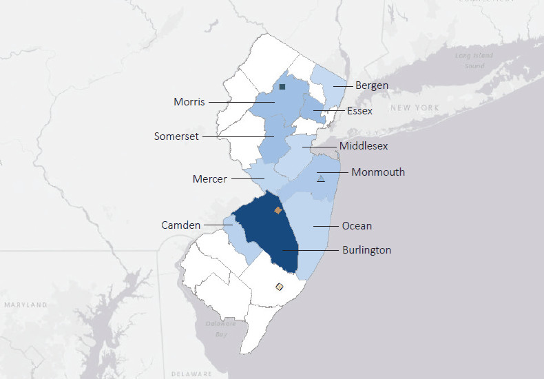 Map presenting top defense contract spending locations within the state of New Jersey with an overlay showing the positions of key military installations differentiated by service and active/reserve affiliation.