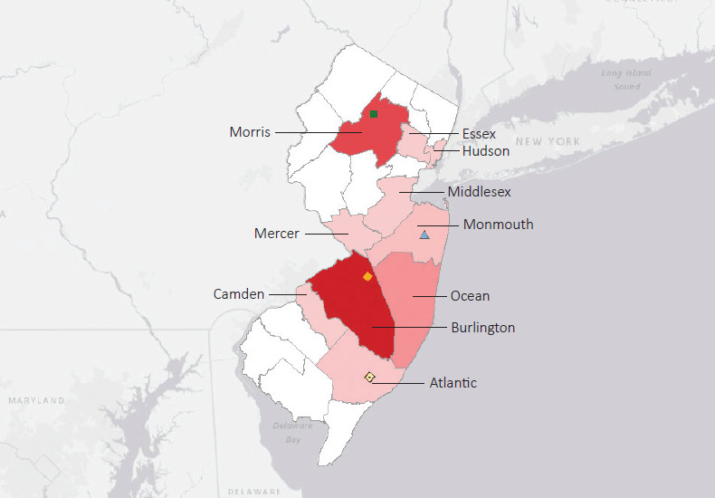 Map presenting top defense personnel spending locations within the state of New Jersey with an overlay showing the positions of key military installations differentiated by service and active/reserve affiliation.
