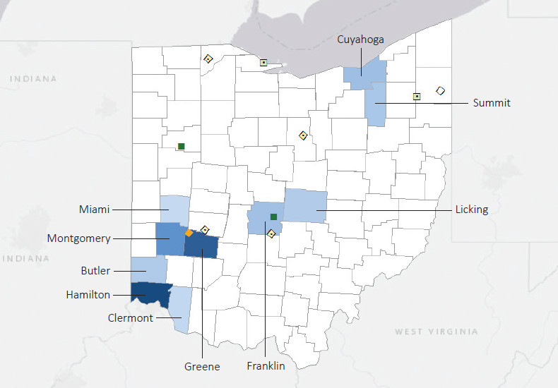 Map presenting top defense contract spending locations within the state of Ohio with an overlay showing the positions of key military installations differentiated by service and active/reserve affiliation.