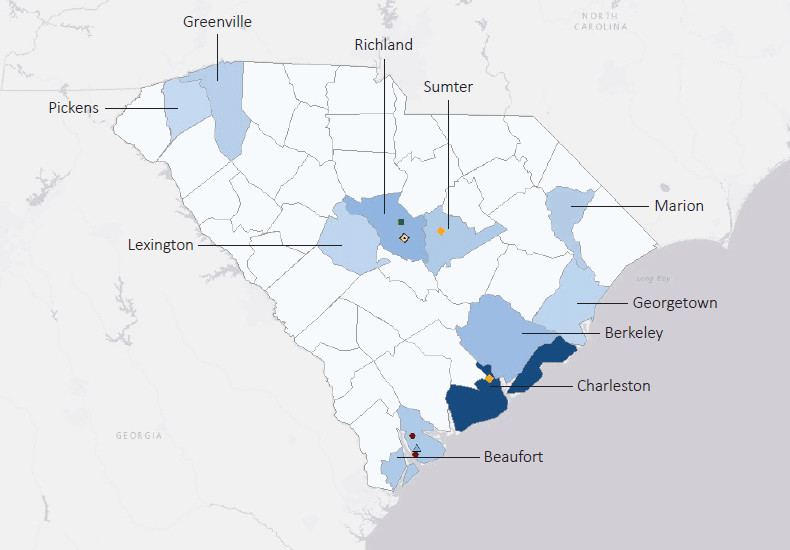 Map presenting top defense contract spending locations within the state of South Carolina with an overlay showing the positions of key military installations differentiated by service and active/reserve affiliation.