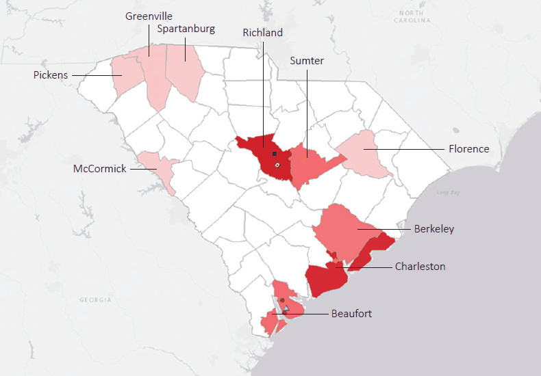 Map presenting top defense personnel spending locations within the state of South Carolina with an overlay showing the positions of key military installations differentiated by service and active/reserve affiliation.